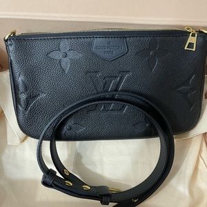 Louis Vuitton empreinte Black Giant Monogram pouch with adjustable strap